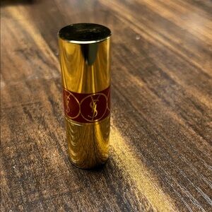 Yves Saint Laurent Gold Lipstick with Red Accent